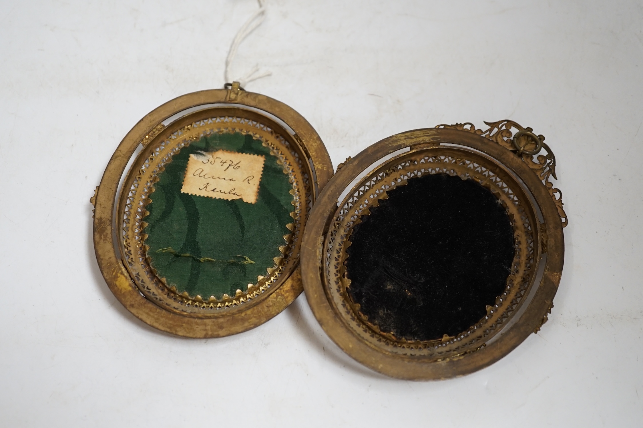J Steiler, miniature on ivory, portrait of Anna R Kaula, and another Le Beau, c.1900, in pierced gilt-metal frames. CITES Submission references G2TXJBBQ & Submission reference MS6J4TYA. Condition - fair